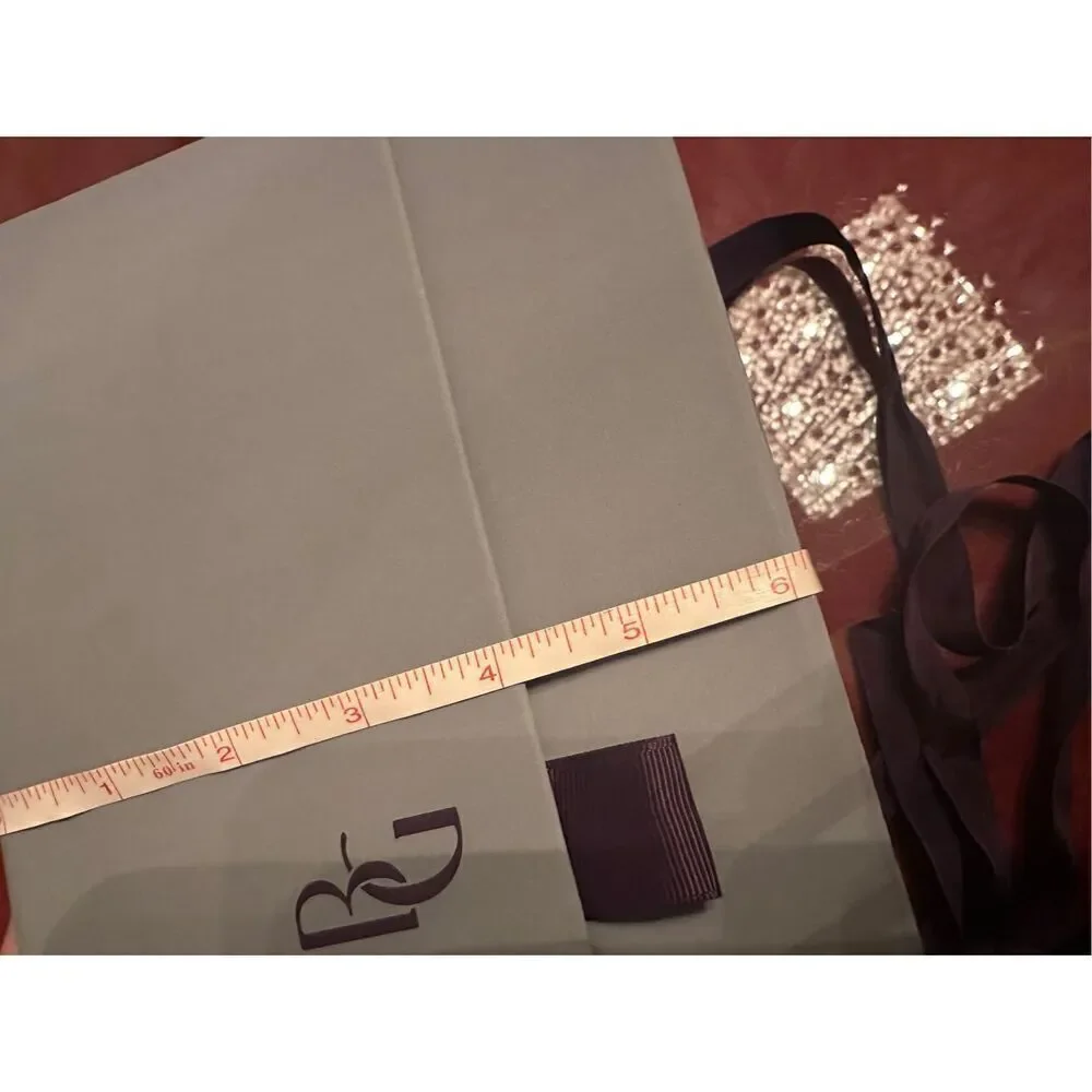 Bergdorf Goodman lavender magnetic gift box with tissue paper‎ & ribbon.